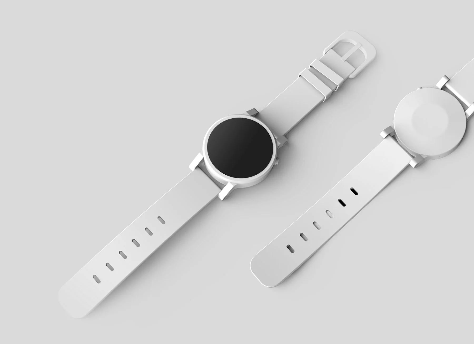 White smartwatch with a silicone strap on a light background