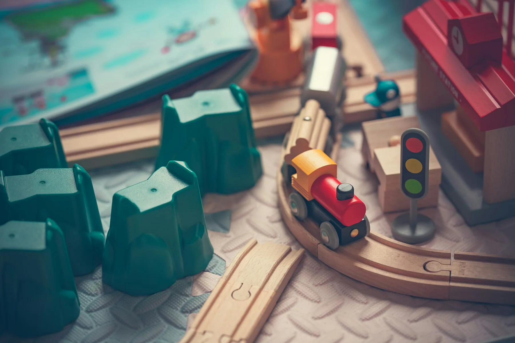 Wooden toy train on a wooden track