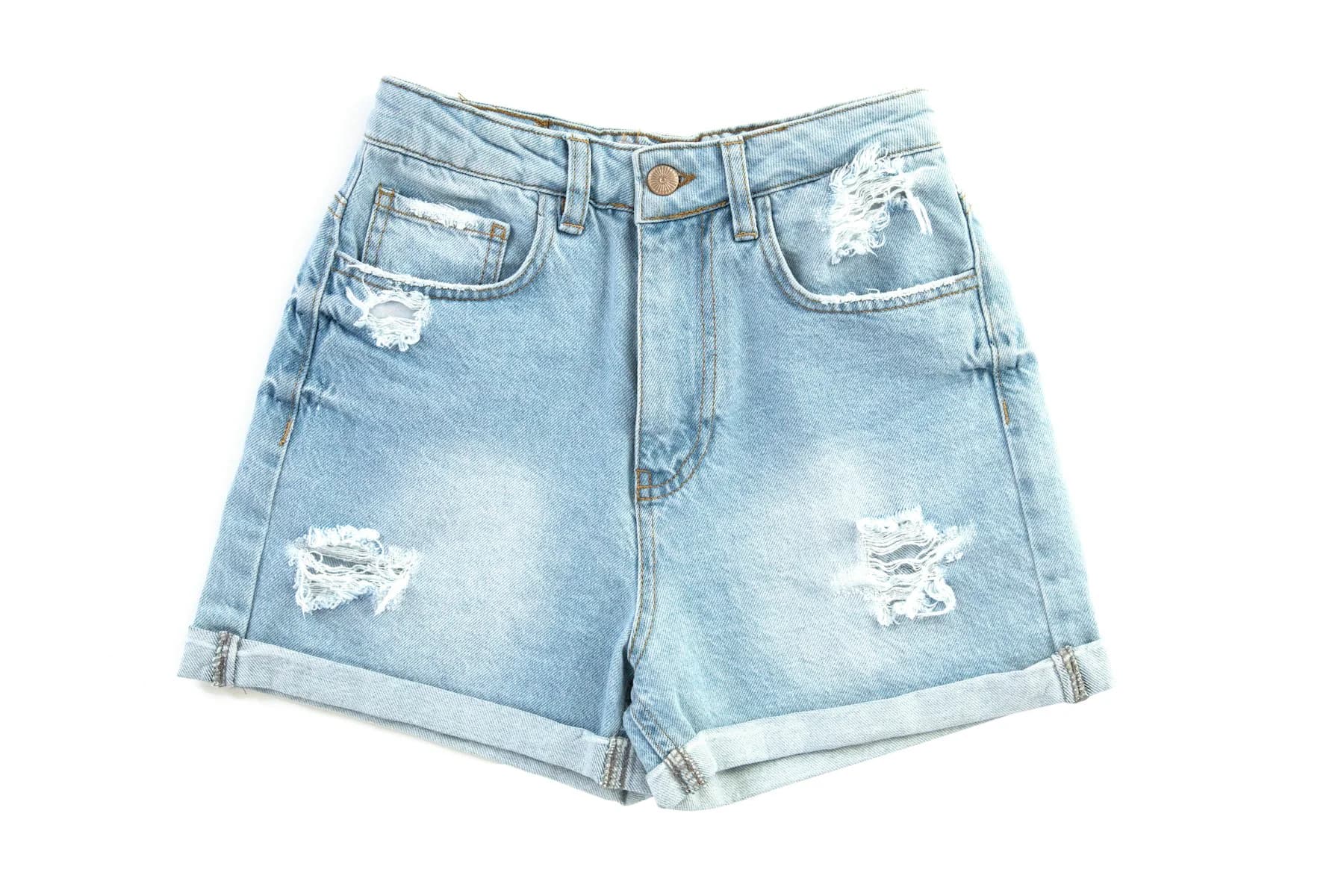Light-wash distressed denim shorts on a white background